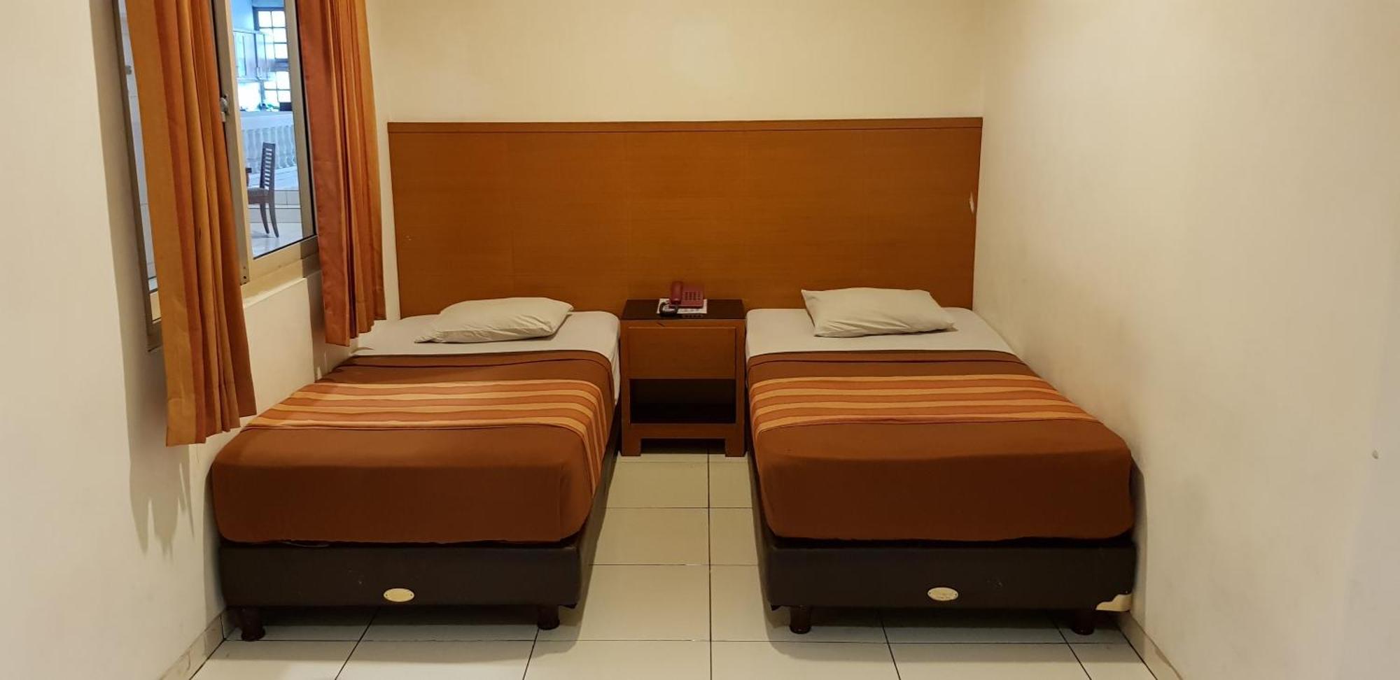 Hotel Dequr Jakarta Kota Pokoj fotografie